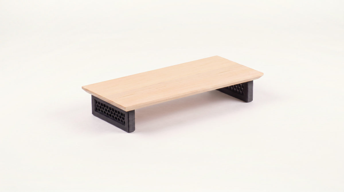 Single monitor riser in Maple with Hex legs in Carbon Black